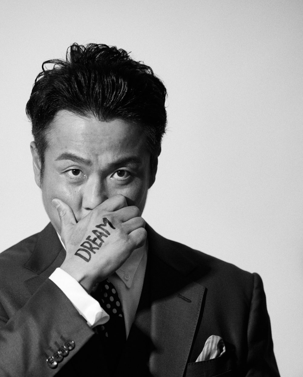 前を向く松島洋行